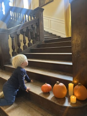 Child exploring the house