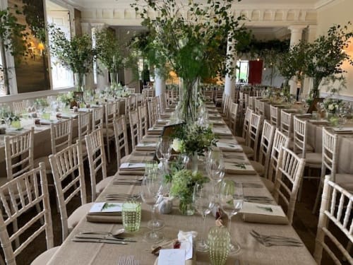 Long tables decorated for wedding